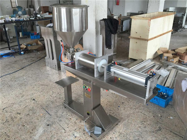 Pusiau automatinis vienos galvos medaus pildymo aparatas